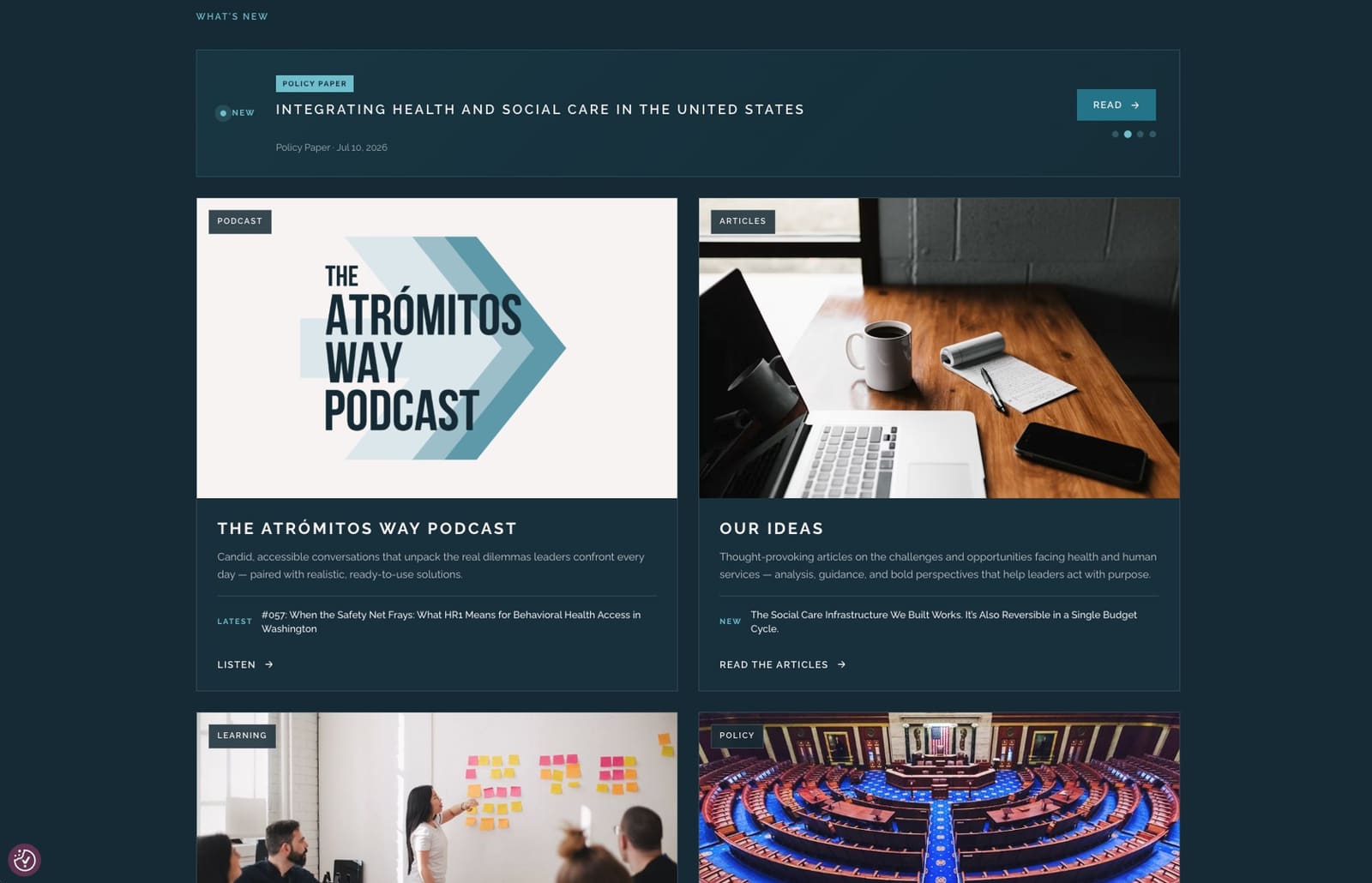 The Atrómitos Knowledge Hub — a What's New feature above cards for the podcast, articles, learning, and policy analysis